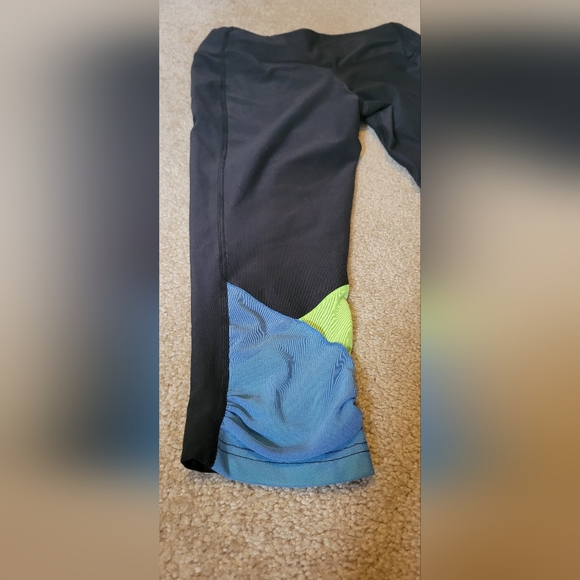 Nike dri-fit womens medium capris black with neon green & blue sheer on back of - Picture 4 of 12